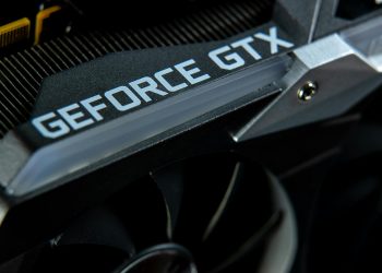 Detailed close-up of a GeForce GTX graphics card showing hardware components.