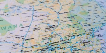 Close-up view of a detailed map highlighting Southern Africa's cities and routes.