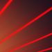 Abstract image with vibrant red laser beams on a dark gradient backdrop, illustrating futuristic design.