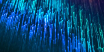 Dynamic image of luminous blue lines with a futuristic, cyberpunk feel.
