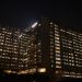 Modern office building illuminated at night