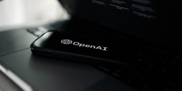 a close up of a laptop on a desk