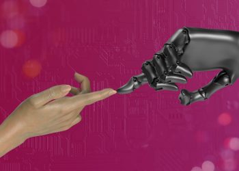 two hands touching each other in front of a pink background