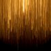 a very long line of yellow lines on a black background