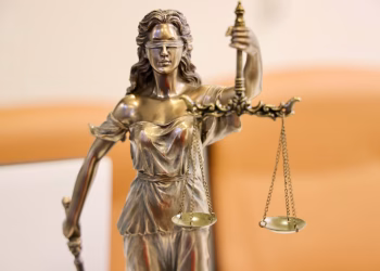 Detailed image of Lady Justice statue, symbolizing fairness and impartiality.