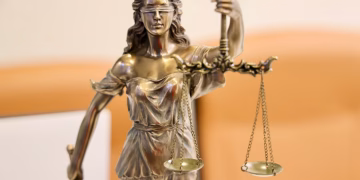 Detailed image of Lady Justice statue, symbolizing fairness and impartiality.