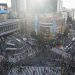 Crowded shibuya crossing with traffic and pedestrians