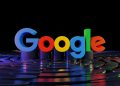 the google logo is displayed in front of a black background