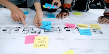 team collaborating with sticky notes