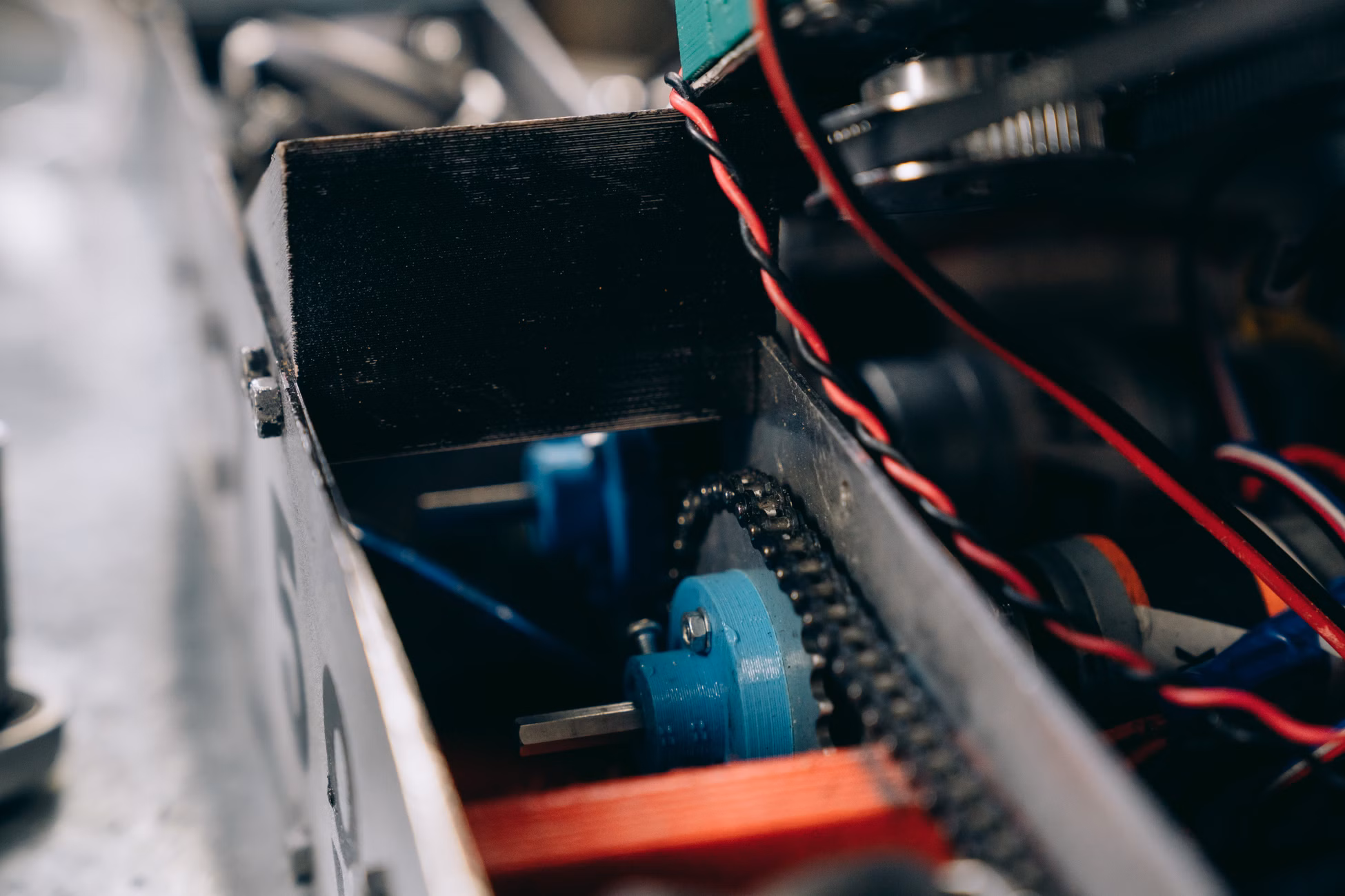 Detailed look at mechanical gears and components inside a machine for industrial use.
