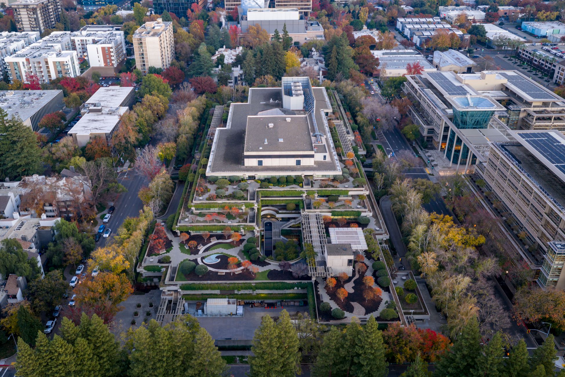 Aerial view of an office complex in Sacramento, California during fall with colorful foliage.