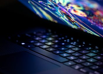 a close up of a laptop computer keyboard