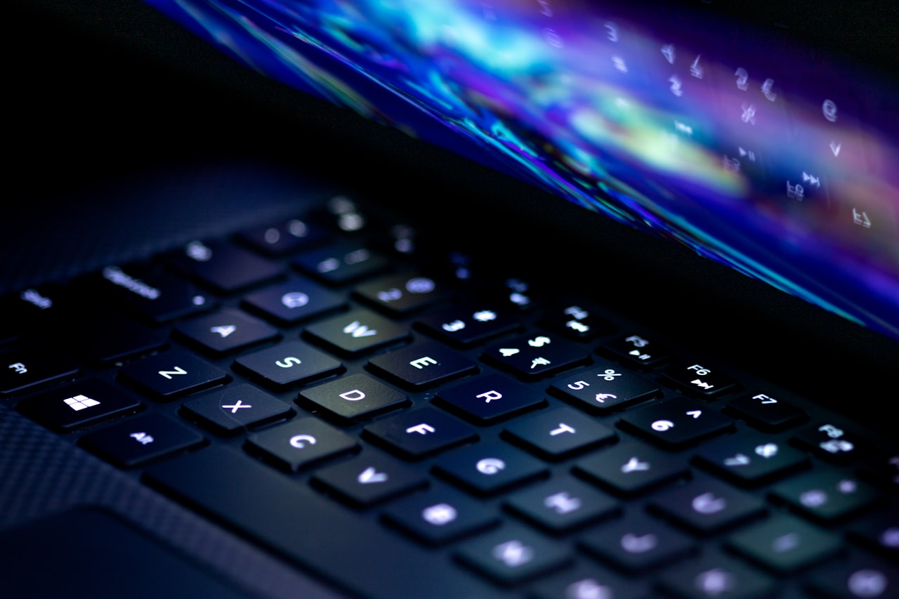 a close up of a laptop computer keyboard