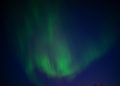 Stunning Aurora Borealis illuminating the night sky in Karasjok, Norway.