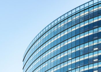 white and blue glass walled building