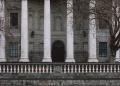 Elegant neoclassical facade of Dublin's Four Courts with iconic white columns.