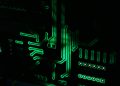 a close up of a computer motherboard in the dark