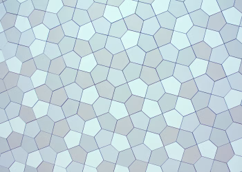 Overhead view of creative abstract backdrop with seamless pattern representing small pentagons with straight lines