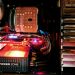 Close-up of a custom gaming PC with RGB lighting, showcasing power supply and components.