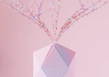 A modern abstract geometric vase with a colorful particle explosion on a pink background.