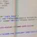 Close-up of HTML and PHP code on screen showing error message and login form data.