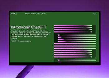 OpenAI Website with Introduction to ChatGPT on Computer Monitor