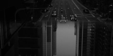 Black and white cars driving on road with double exposure of high skyscrapers in modern city downtown