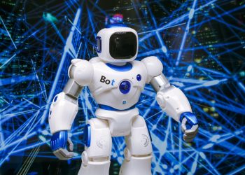 Advanced humanoid robot with glowing blue accents in a digital network setting.