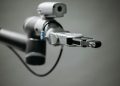 Close-up of a robotic arm showcasing advanced technology and innovation in an indoor environment.