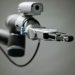 Close-up of a robotic arm showcasing advanced technology and innovation in an indoor environment.