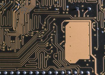 Detailed view of intricate circuit board patterns in technology hardware.