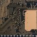 Detailed view of intricate circuit board patterns in technology hardware.