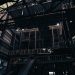 Low angle view of a dimly lit factory interior, showcasing industrial architecture in Pingtung, Taiwan.