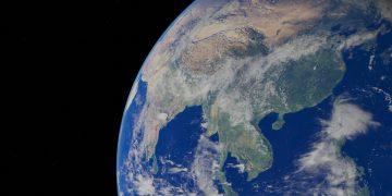 A breathtaking satellite view of Earth highlighting Asia with clear oceans.