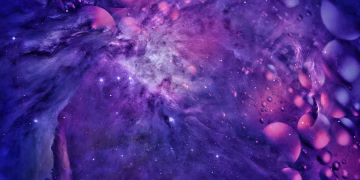 Explore a purple-hued abstract cosmic scene with floating shapes and bubbles.