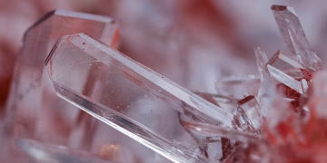 Detailed close-up of clear quartz crystals showcasing intricate natural formations.