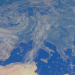 A breathtaking view of Europe from space showcasing the Mediterranean Sea and atmospheric patterns.
