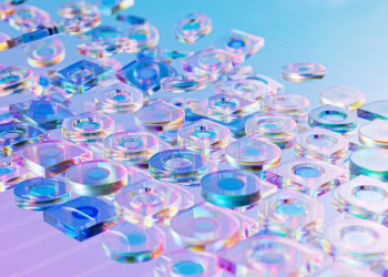 Vibrant holographic glass objects creating a futuristic abstract design.