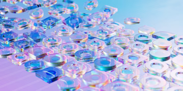 Vibrant holographic glass objects creating a futuristic abstract design.