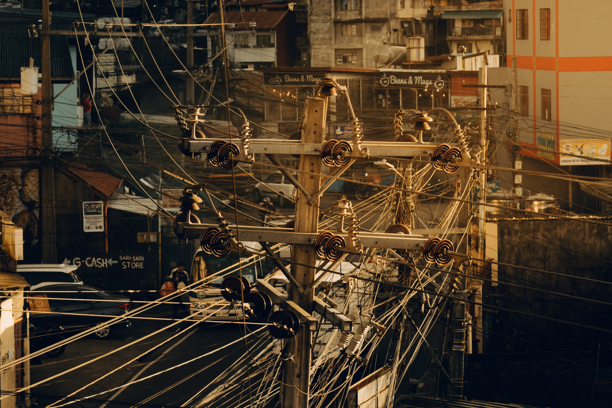 Tangled power lines in an urban setting revealing intricate connections.