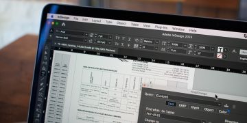 a close up of a computer screen with a table in the background