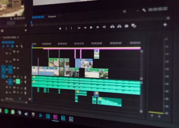 Close-up of a video editing timeline interface on a computer screen, showcasing professional software in action.