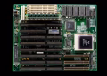 A close-up of a vintage motherboard highlighting microchips and electronic components.