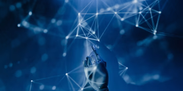 A robotic hand reaching into a digital network on a blue background, symbolizing AI technology.