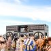 Lively outdoor music festival in Cape Town with a large crowd and unique decor.