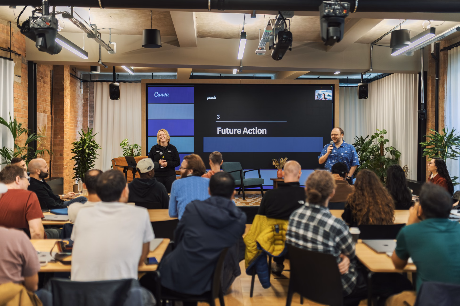 Interactive professional presentation in a modern office setting with diverse audience.