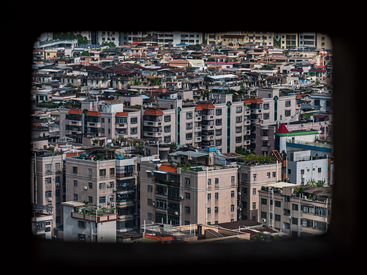 Dense urban cityscape with many apartment buildings.