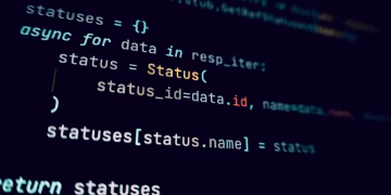 Detailed view of programming code in a dark theme on a computer screen.
