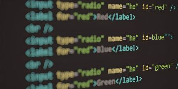 HTML code displayed on a screen, demonstrating web structure and syntax.