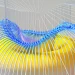 A dynamic 3D render with vibrant colors and a wireframe pattern, symbolizing modern technology.